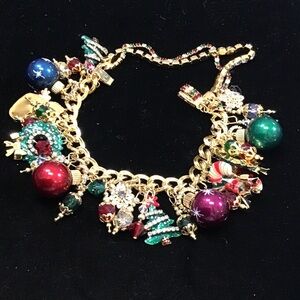 Vintage 22 k plated. Lunch at  the ritz Festive Gold Charm Bracelet collector